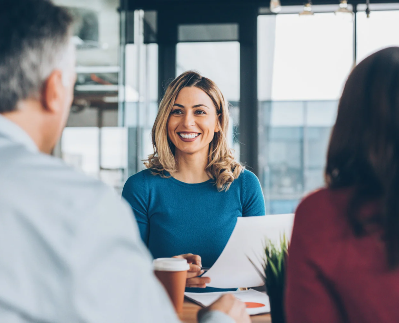 agent talking to couple about title insurance
