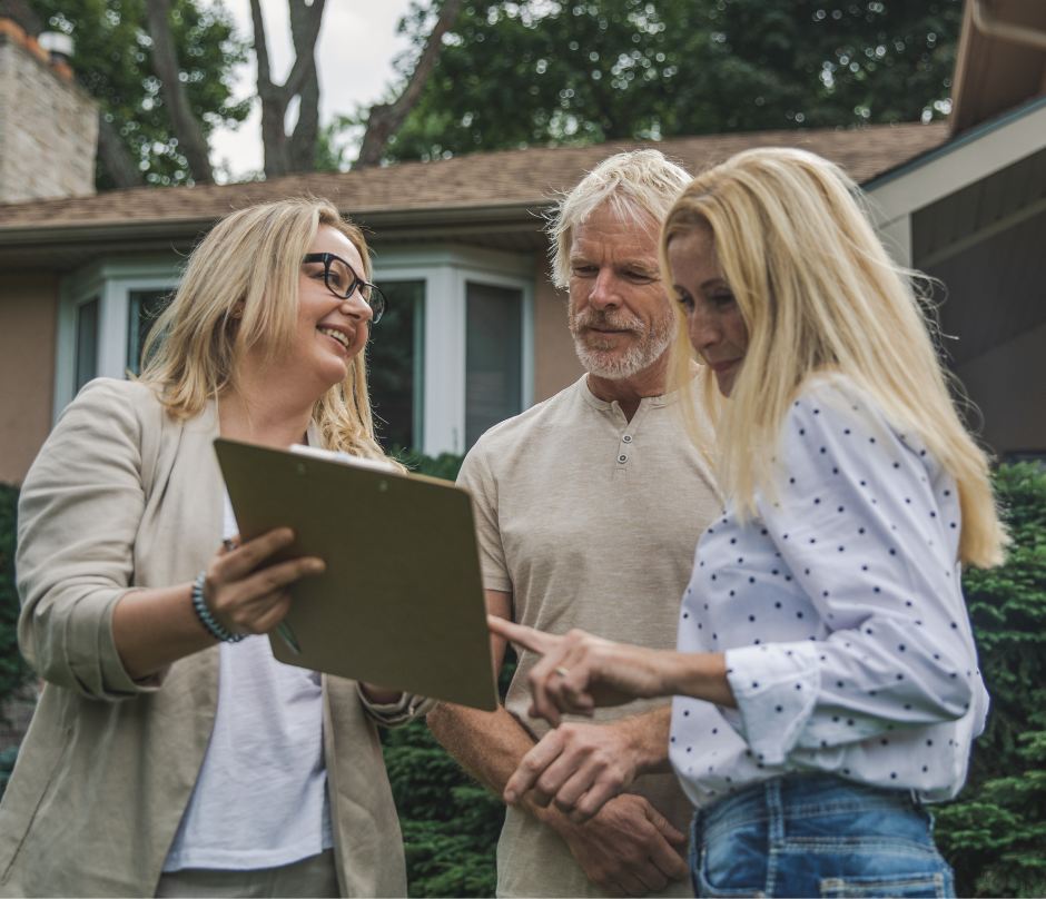 a real estate agent shows the title insurance to her buyer