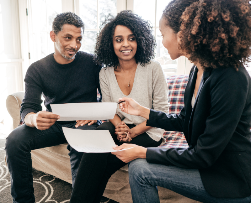 mortgage agent talking to interested home buyers