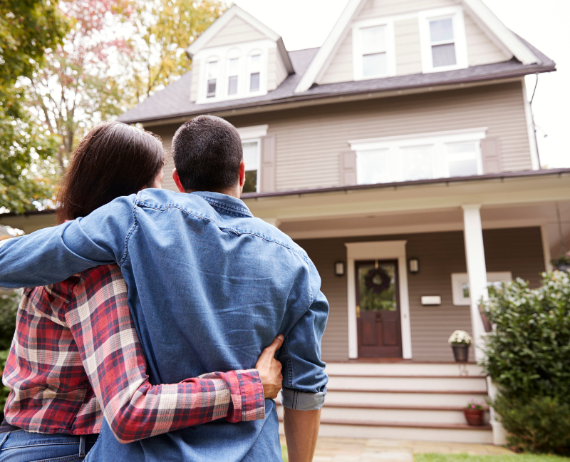 couple looking at their new home