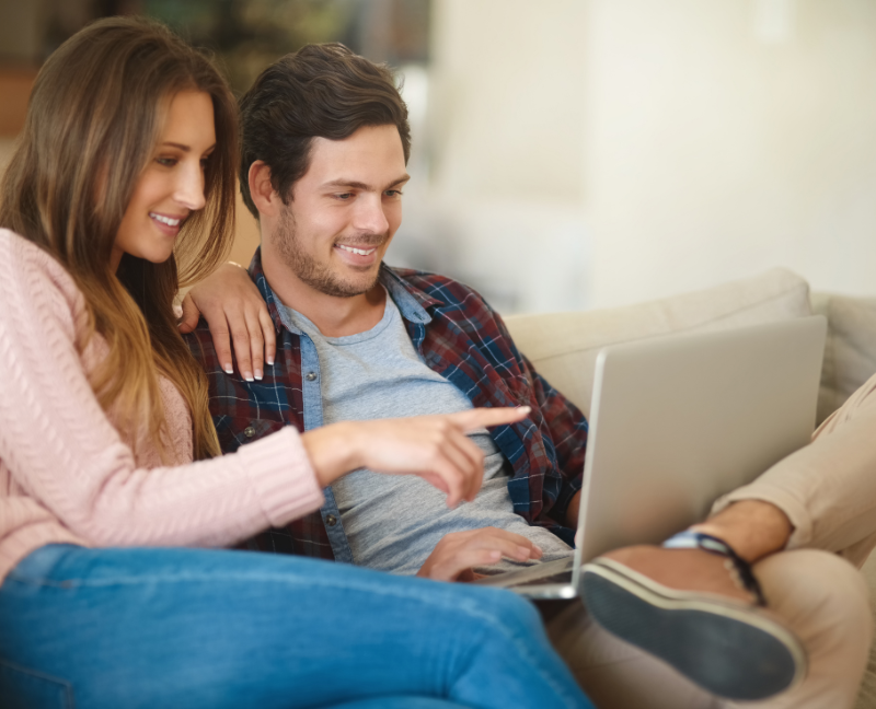 couple looking for new home online