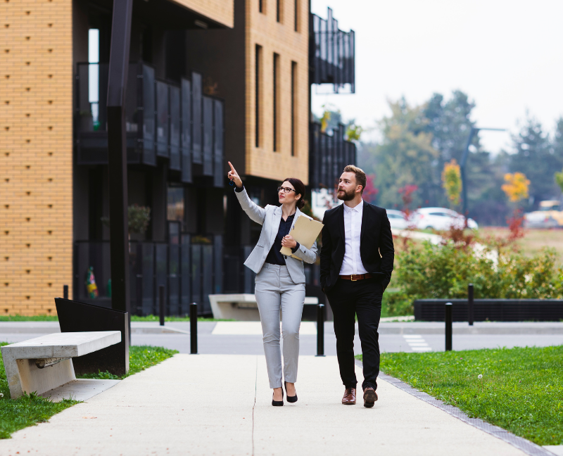 real estate agent walking in the neighborhood