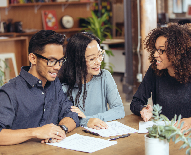 mortgage lender talking to home buyers