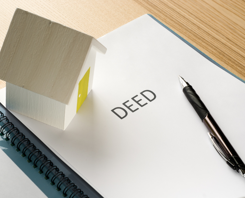 house deed with pen