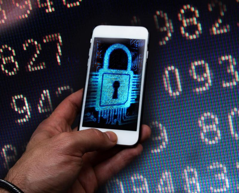 cybercrime hacker using phone for identity theft
