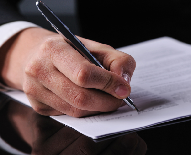 signing a loan paper