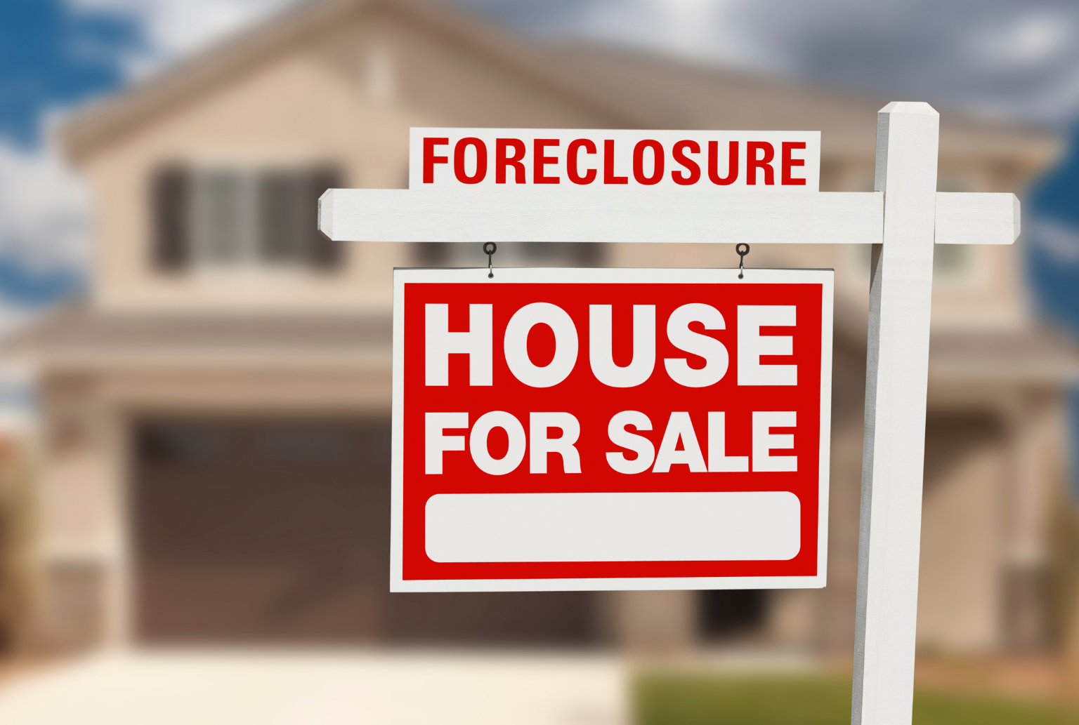 foreclosure and house for sale sign