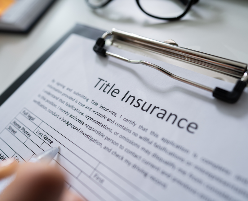 filling out a title insurance document