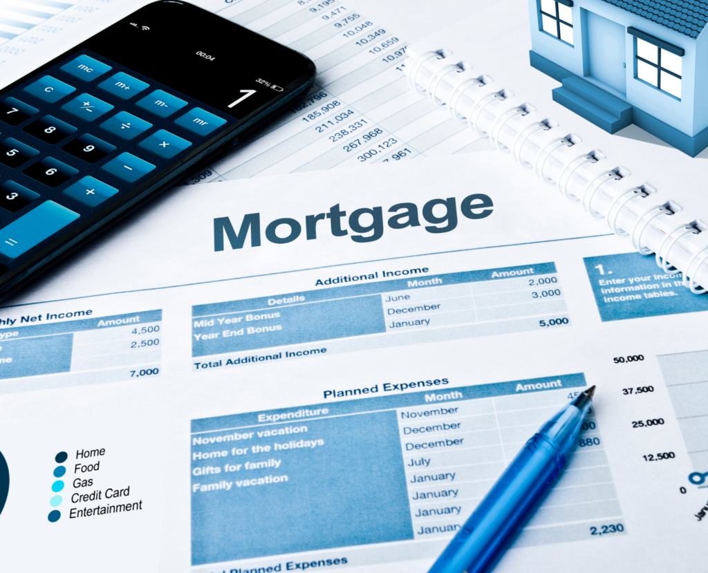 mortgage planner with calculator and pen